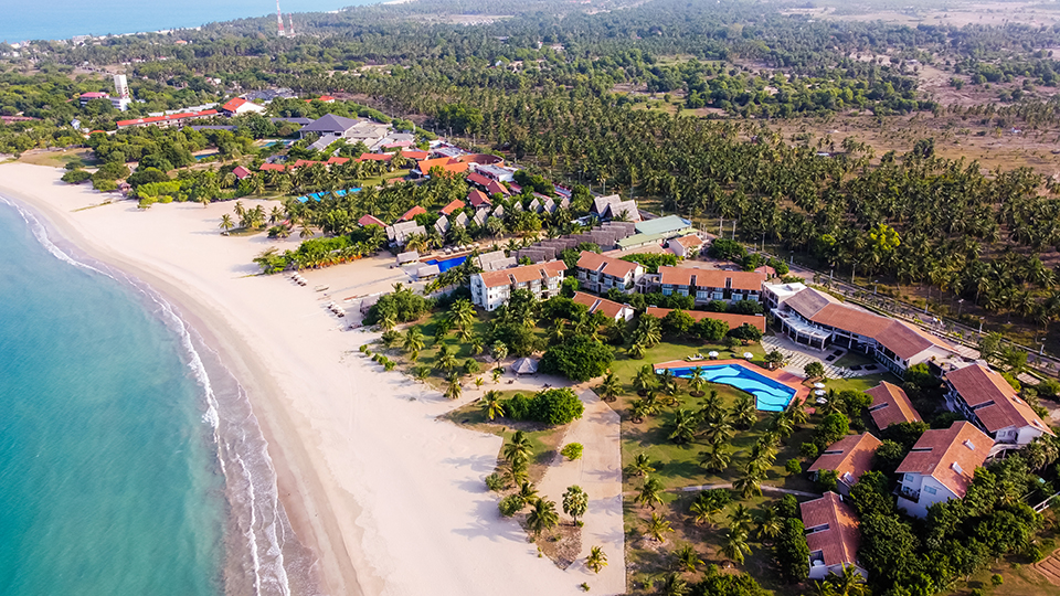 Stunning Aerial View of the Luxury Hotels With Swimming Pools Next to the Pasikuda Beach in Sri Lanka